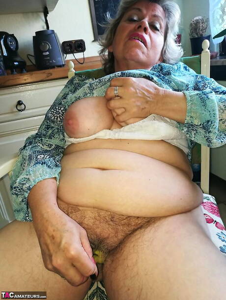 TAC Amateurs pics collection featuring Caro in sex with dildo scene